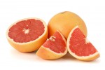 Picture of a grapefruit with cut pieces suggesting the origin of grapefruit seed extract