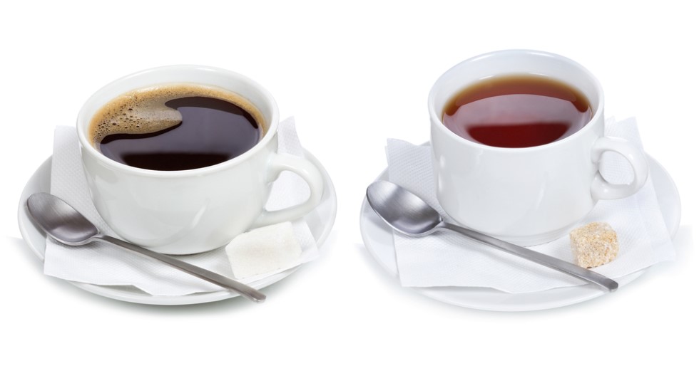 A single cup of coffee and a single cup of tea - shown to represent the fact that it is likely to consume moderate amounts of caffeine-containing beverages with minimal risk of worsening seborrheic dermatitis symptoms